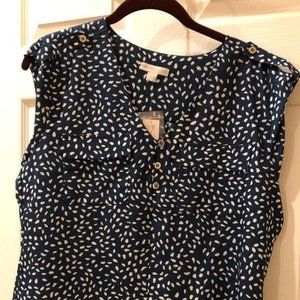 Sleeveless blue and white top